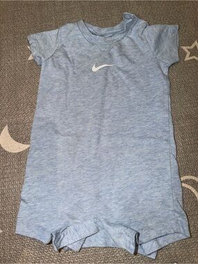 Nike Heather Light Blue Baby One-Piece Romper with White Swoosh